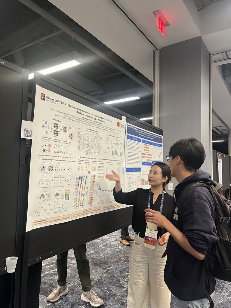 Naqing Presenting Poster
